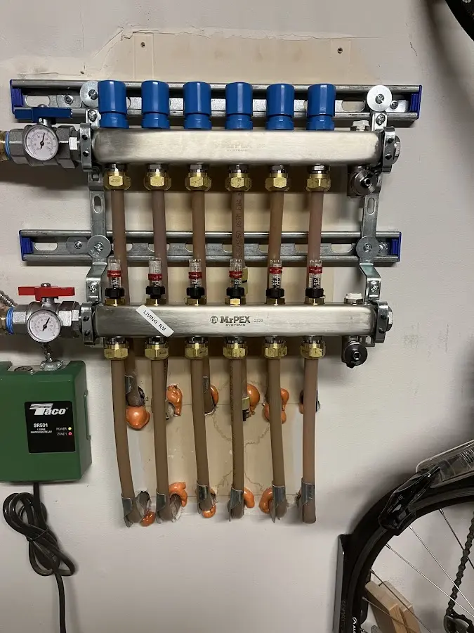 Plumber performing Water Heater Repair at a residential property in North Salt Lake